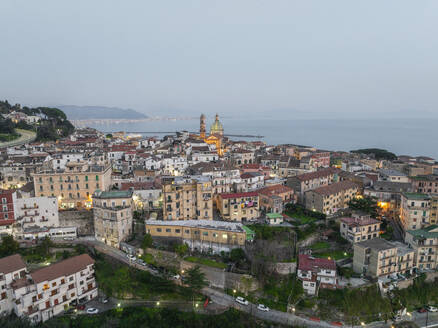 Aerial view of the cathedral in Vietri sul Mare old town at sunset, an old town along the Amalfi Coast, Salerno, Campania, Italy. - AAEF27690