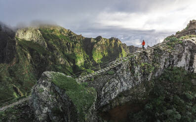 Aerial drone view of PR1 hike, stairway to heaven pathway, near Pico de Areeiro, Madeira Island, Portugal. - AAEF27724
