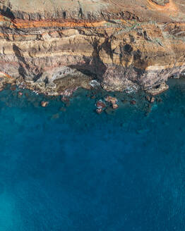 Aerial drone top-down view of the Eastern Peninsula coastline of Madeira island, Portugal. - AAEF27730