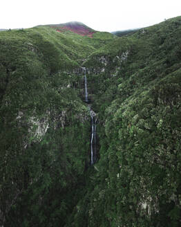 Aerial drone view of Risco Waterfall at the Lagoa das 25 Fontes trail PR6, Madeira island, Portugal. - AAEF27734