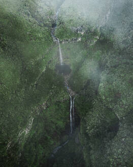 Aerial drone view of Risco Waterfall at the Lagoa das 25 Fontes trail PR6, Madeira island, Portugal. - AAEF27735