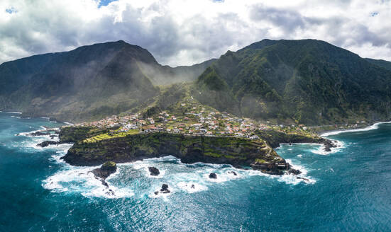 Aerial drone view of Seixal, coastal town on the North of Madeira Island, Portugal. - AAEF27739