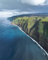 Aerial drone view of Madeira coastline and cliffs from Ponta do Pargo, furthest south end of Madeira island, Portugal. - AAEF27741