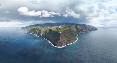 Aerial drone view of Madeira coastline, lighthouse and cliffs from Ponta do Pargo, panorama of the furthest south end of Madeira island, Portugal. - AAEF27743