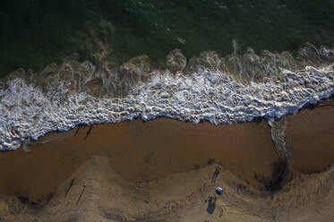 Aerial view of Kovalam beach in Kerala with beautiful blue ocean and sandy shoreline, India. - AAEF27752