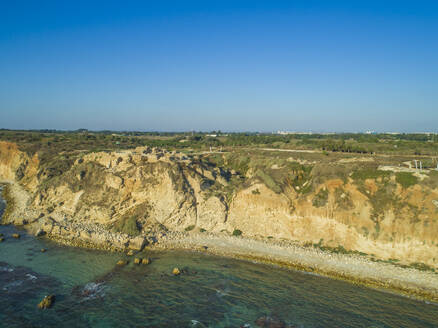 Aerial view of clear blue waters and sandy coastline in Herzliya, Central District, Israel. - AAEF27791