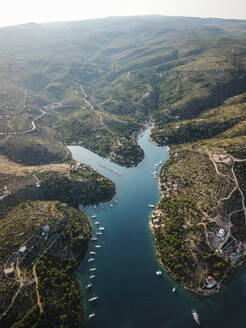 Aerial view of Brac Island bay with boats, Croatia. - AAEF27853