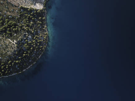 Aerial view of Azure Adriatic Coastline with Pine Forests on Brac Island, Croatia. - AAEF27855