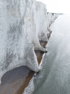 Aerial drone view of the Seven Sisters Cliffs National Park during sunset in the Eastbourne, England, United Kingdom. - AAEF28002