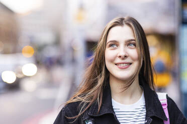 Smiling young woman with long brown hair - WPEF08679