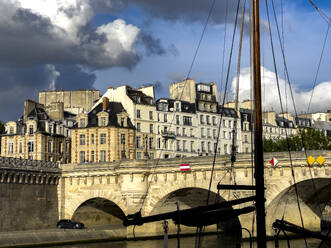 Boat mast, bridge and buildings in Paris, France, Europe - RHPLF32394