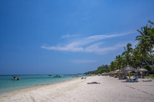 View of Beach at Trou-aux-Biches and turquoise Indian Ocean on sunny day, Trou-aux-Biches, Mauritius, Indian Ocean, Africa - RHPLF32414