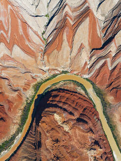 Aerial abstract view taken by drone of particular rock formation during a sunny summer day, Mexican Hat, Utah, United States of America, North America - RHPLF32484