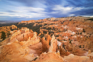 A long exposure captures the beautiful landscape in Bryce Canyon National Park during a summer sunrise, Utah, United States of America, North America - RHPLF32489