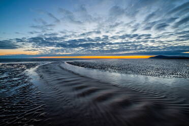 Sunset view from Sandy Gap, Walney Island, towards the distant Irish Sea and Black Combe, Walney Island, Lancashire, England, United Kingdom, Europe - RHPLF32547