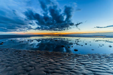 Sunset from Sandy Gap on Walney Island, view towards the distant Black Combe across the Irish Sea, Duddon Estuary and Cumbrian Coast, Walney Island, Lancashire, England, United Kingdom, Europe - RHPLF32559