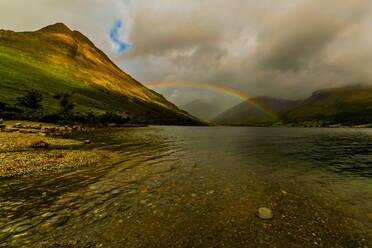 View towards distant Great Gable with rainbow across Wast Water with Yewbarrow on the left and the Scafell Range right, Wasdale, Lake District National Park, UNESCO World Heritage Site, Cumbria, England, United Kingdom, Europe - RHPLF32564