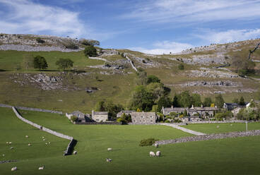 Village of Feizor in spring backed by Pot Scar, Yorkshire Dales National Park, Yorkshire, England, United Kingdom, Europe - RHPLF32722