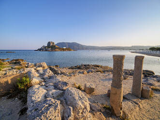 St. Stefanos Basilica Ruins and Kastri Island at sunset, Agios Stefanos Beach, Kos Island, Dodecanese, Greek Islands, Greece, Europe - RHPLF32788