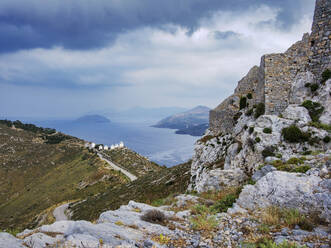 Medieval Castle and Windmills of Pandeli with stormy weather, Leros Island, Dodecanese, Greek Islands, Greece, Europe - RHPLF32904