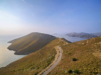 View towards the Windmills of Pandeli at sunrise, elevated view, Leros Island, Dodecanese, Greek Islands, Greece, Europe - RHPLF32911