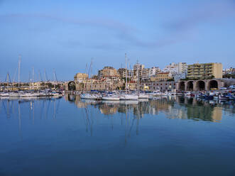 Venetian Dockyards at the Old Port at dusk, City of Heraklion, Crete, Greek Islands, Greece, Europe - RHPLF32997