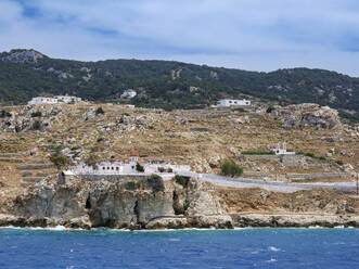 View towards the Chapel and Cemetery in Pigadia, Karpathos Island, Dodecanese, Greek Islands, Greece, Europe - RHPLF33176