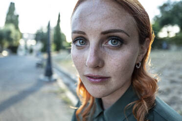 Young woman with red hair, Rome, Italy - ISF26297