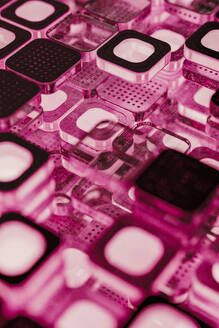 Abstract microchip blocks with illuminated pink light - JPF00497