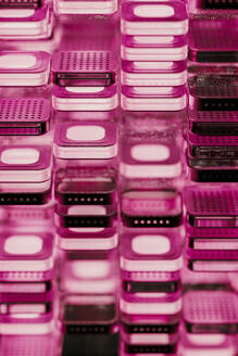 Layers of microchip blocks with illuminated pink light - JPF00498