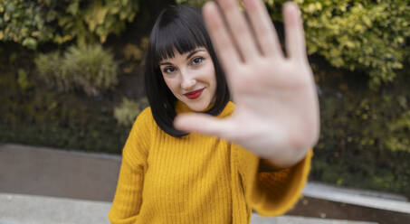 Woman with bangs doing stop gesture - ALZF00012