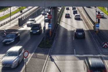 Traffic on the central ring road in munich, mobility, transportation, multiple Lane Highway, speed cameras, speed limit, blurred motion, photos were taken from public ground, Munich, Bavaria, Germany - MAMF02964