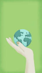 A single hand holds the Earth, symbolizing global responsibility to protect our planet. - MSMF00182