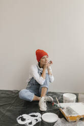 Gdansk, Poland, woman making renovations in her new apartment and dreamss - VIVF01277