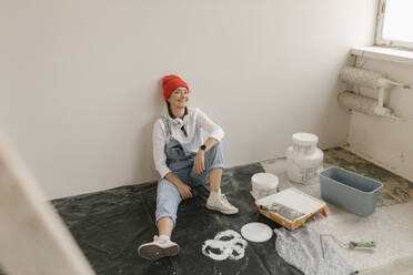 Gdansk, Poland, woman making renovations in her new apartment and dreams - VIVF01281