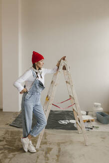 Gdansk, Poland, woman making renovations in her new apartment and dreams - VIVF01290