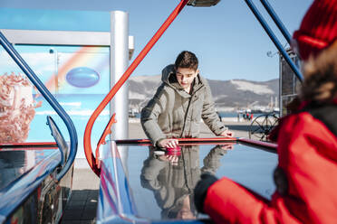 Russia.Krasnodar. Children play air hockey - NLAF00383