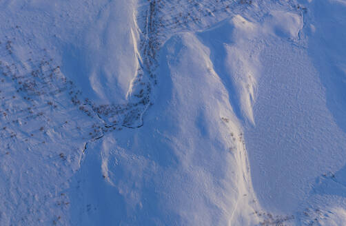 Aerial view of frozen mountains in Russia. - AAEF28210