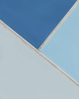 Aerial view of a blue and geometrical salt flats in Sicily, Italy. - AAEF28631