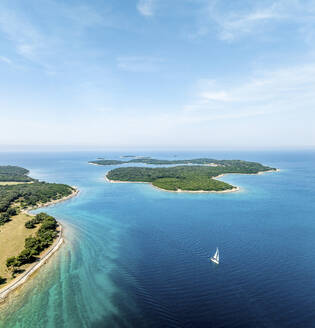 Aerial view of sailing boat near Brijuni National Park islands, Istria, Croatia. - AAEF28691