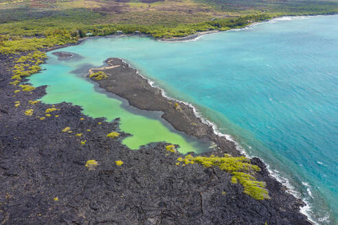 Aerial drone view of Kiholo Bay and Wainanalii Pond, Hawaii Island, Hawaii, United States. - AAEF28703