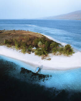 Aerial view of a catamaran along the beach, Gili Kondo, East Lombok, Indonesia. - AAEF28955