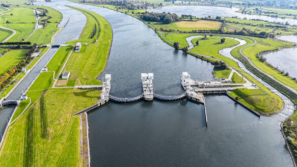 Aerial drone view of Hydro Electric powerstation Nederrijn, Waterkrachtcentrale Maurik, The Netherlands. - AAEF28988