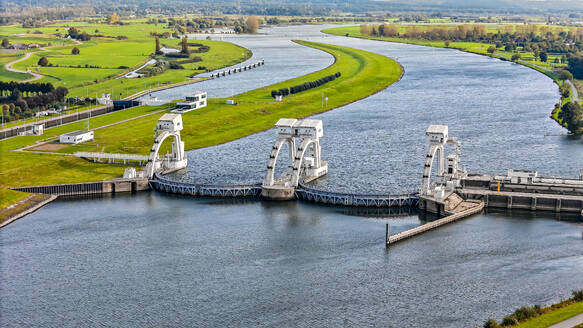 Aerial drone view of Hydro Electric powerstation Nederrijn, Waterkrachtcentrale Maurik, The Netherlands. - AAEF28990