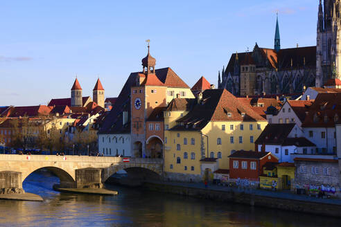 Germany, Bavaria, Regensburg, Edge of historic old town with arch bridge in foreground - JTF02421