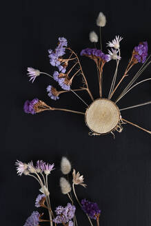 Studio shot of DIY decorations made of dried flowers and wood - GISF01070