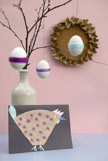 Studio shot of DIY Easter eggs and paper craft hen - GISF01071