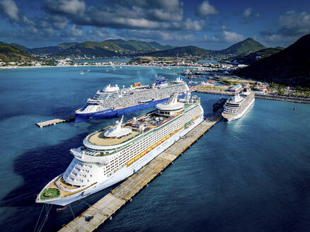 Cruise ships docked in a scenic tropical port - ISF27330